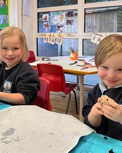 Happiness is making hot cross buns in Nursery